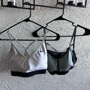 Two NIKE sports bras